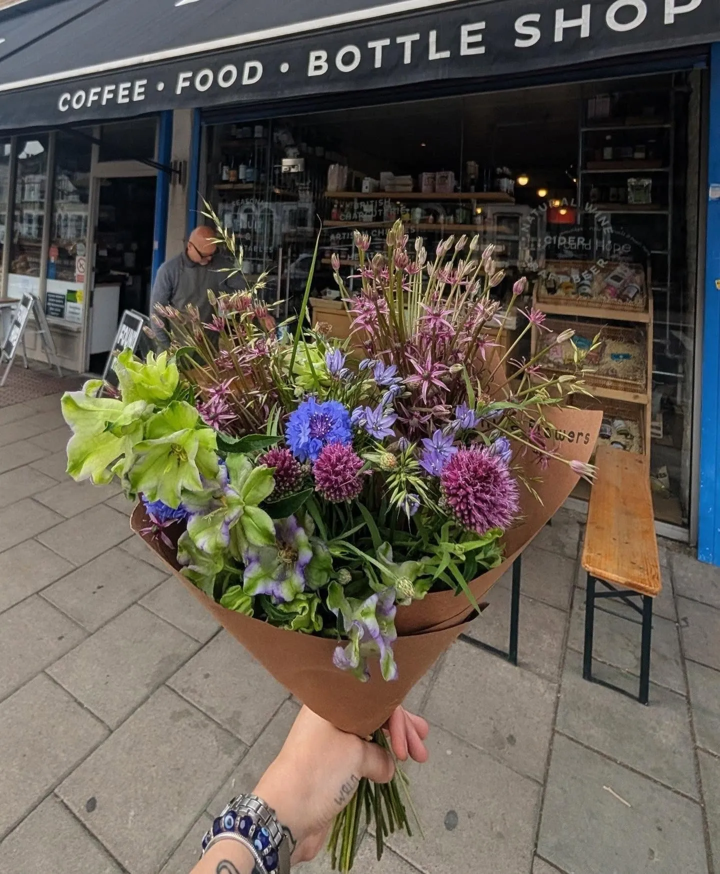 Flowers outside the Found Hope shopfront on Hither Green Lane